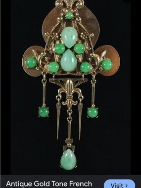 Antique-Inspired Gold Tone Drop Pendant with Green Cabochons